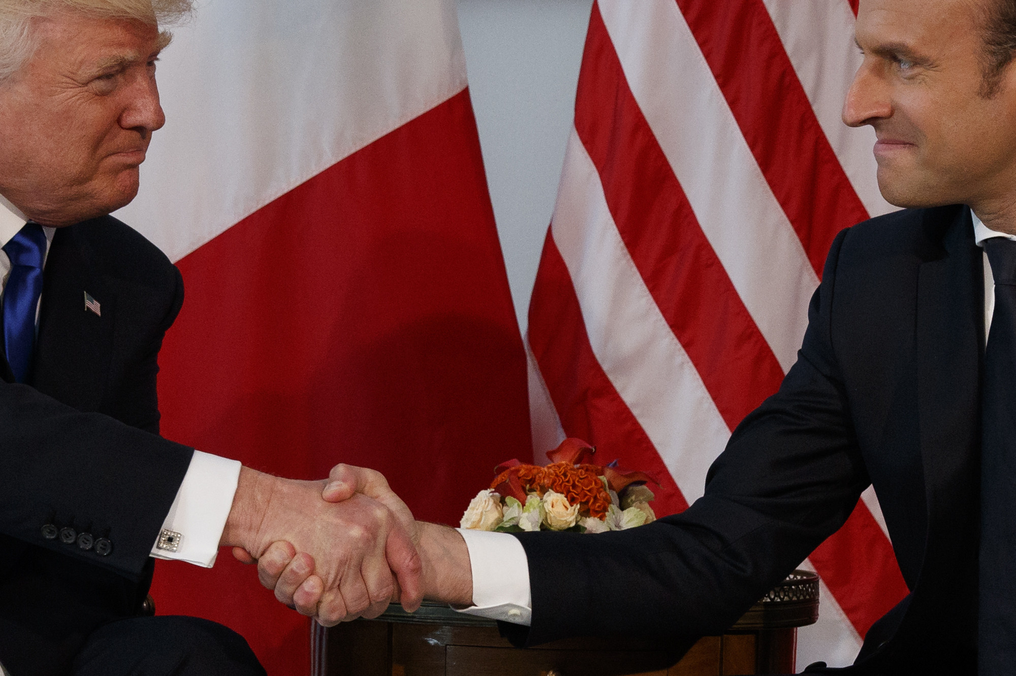Macron’s Alarmed Handshake with Trump Sparks Global Attention