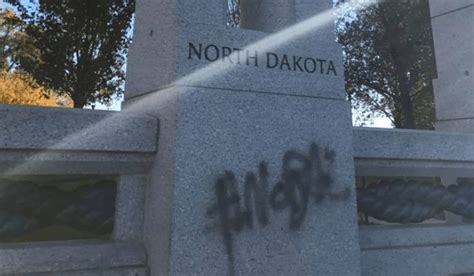 Vandals Desecrate Washington WWII Memorial with Neon Graffiti and Soap